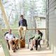 lane collin beth sitting on deck of cabin